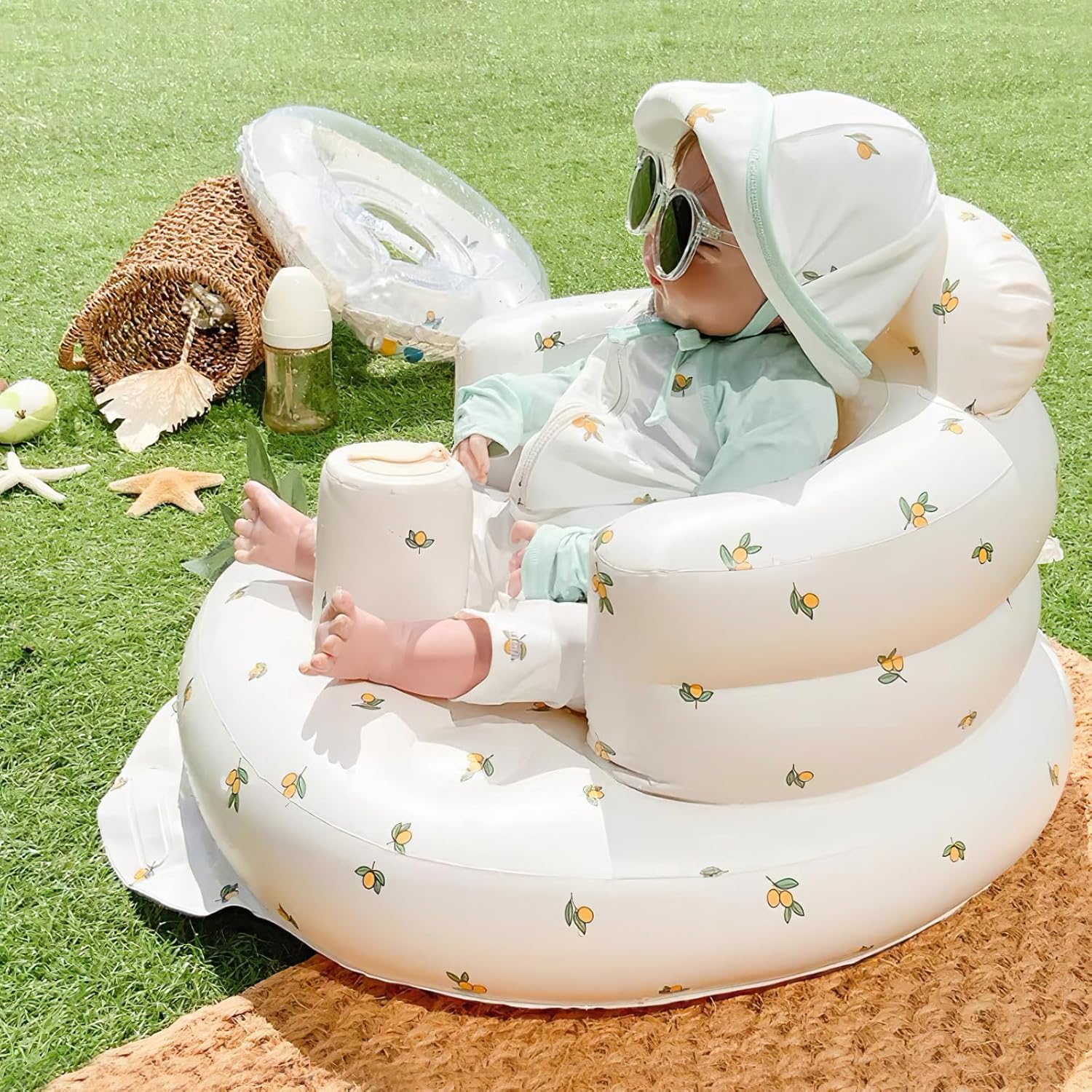 Infant inflatable seat with suction cup and built-in air pump