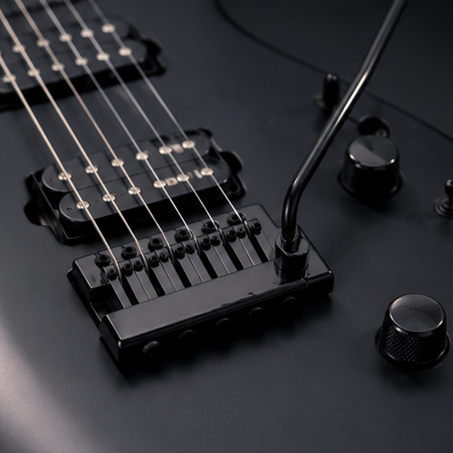 Plug-in guitar tremolo bridge