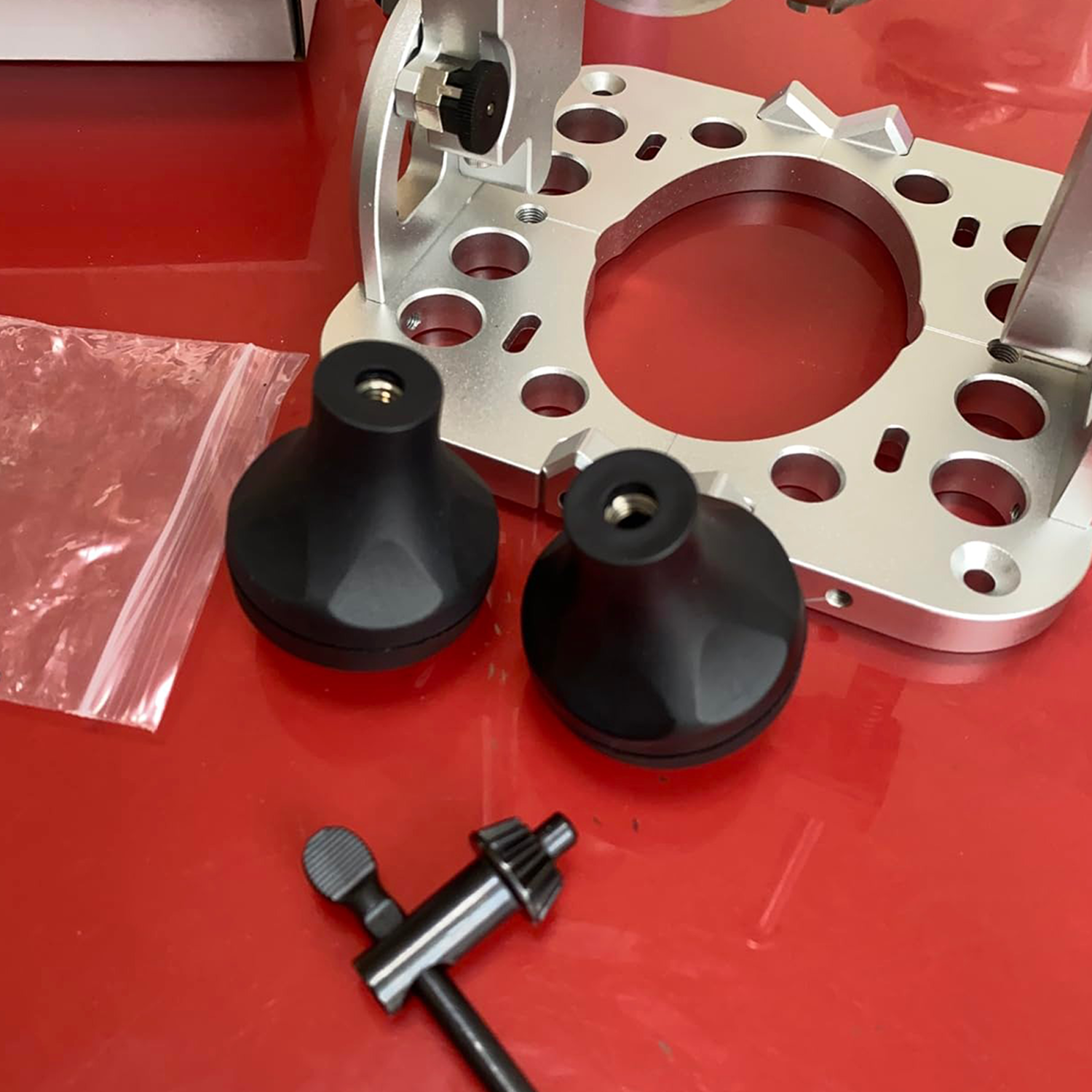Portable drilling guide with bushed ball bearing guide rod