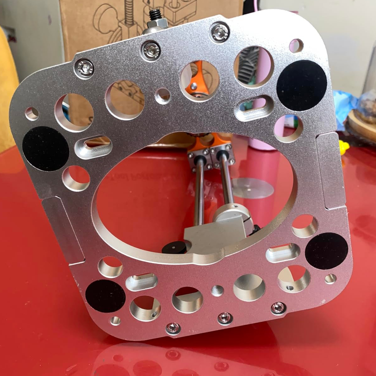 Portable drilling guide with bushed ball bearing guide rod