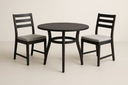 Table ronde en bois noir avec deux chaises coussins gris