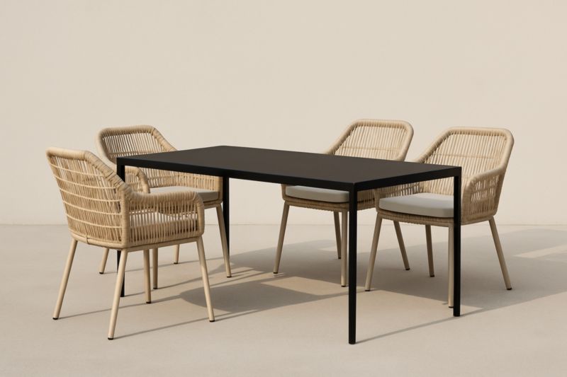 Ensemble de table en aluminium noir et chaises en rotin naturel