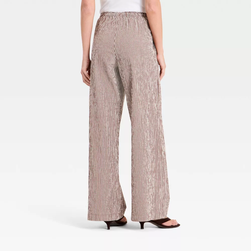 Elegant White Peplum Top & Wide-Leg Pants Set