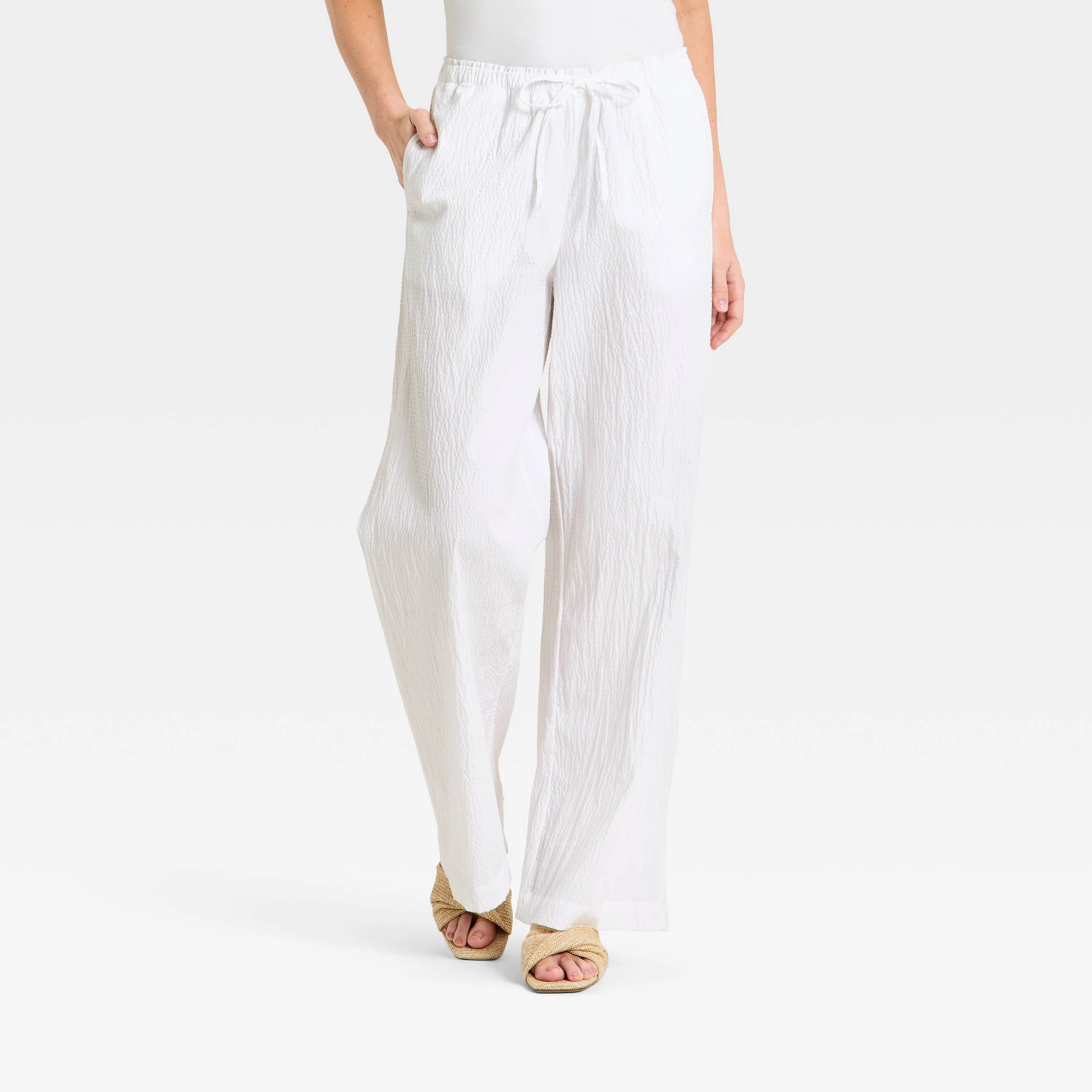 Elegant White Peplum Top & Wide-Leg Pants Set