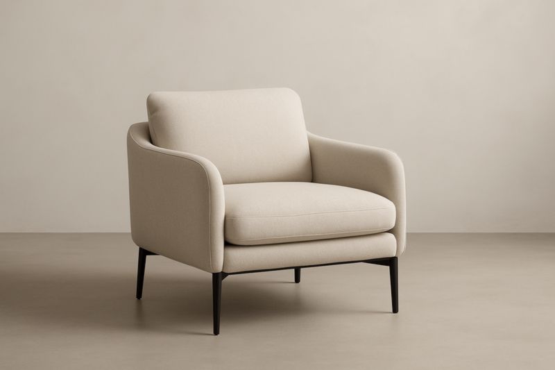 Fauteuil en tissu beige avec pieds en métal