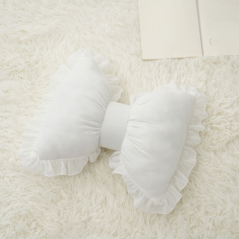 Coussin décoratif en forme de nœud