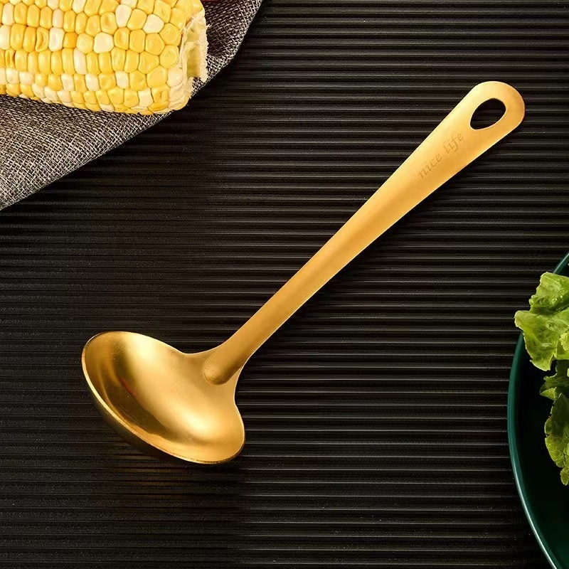 Spatule écumoire multifonction en acier inoxydable