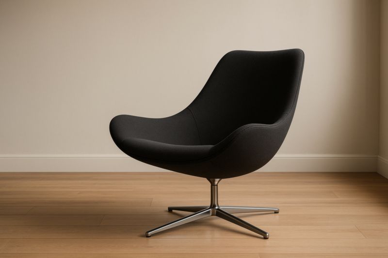 Fauteuil pivotant tissu polyester noir base acier chromé