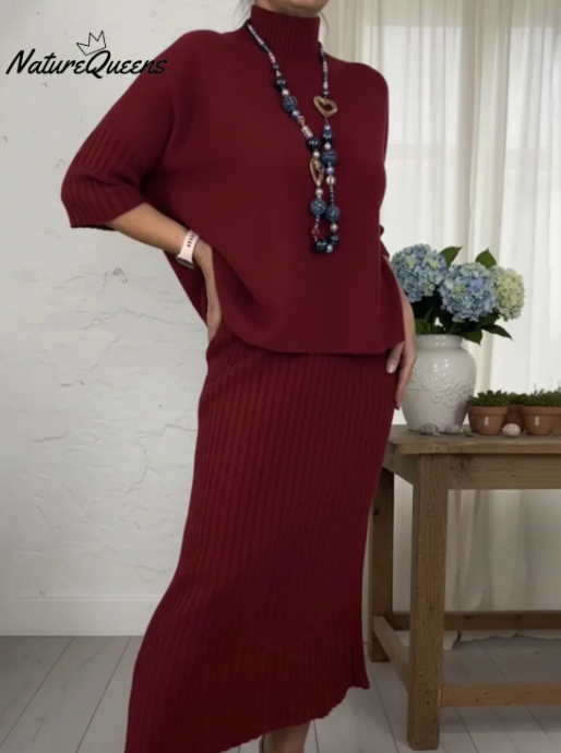 Елегантен комплект от две части: пуловер с висока яка и плетена пола