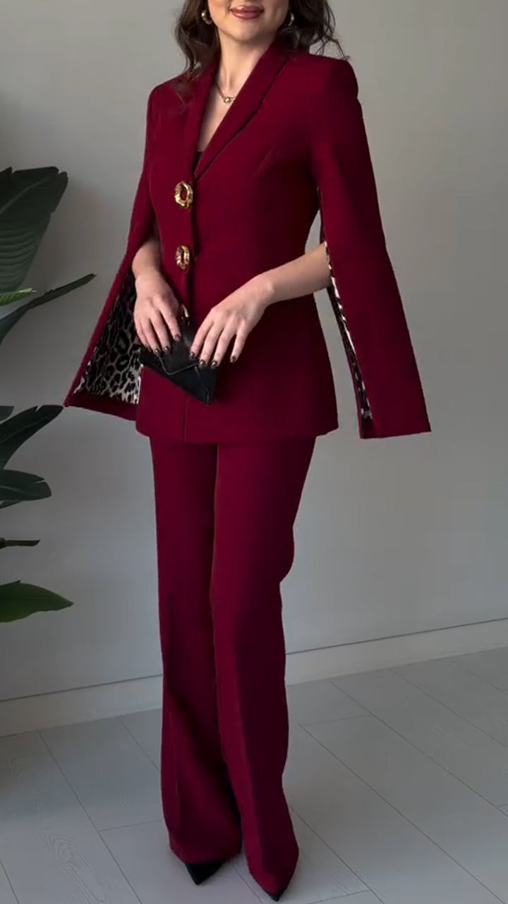 Damski garnitur: kurtka z kołnierzem i metalową klamrą + spodnie – idealny do pracy