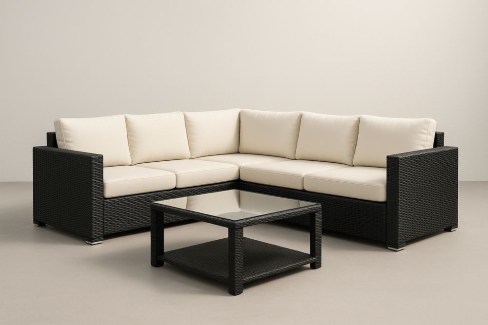 Canapé d'angle en résine tressée avec table en verre noir et blanc