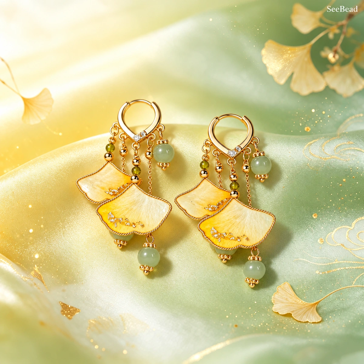 Twin Ginkgo handmade silk earrings on celadon satin