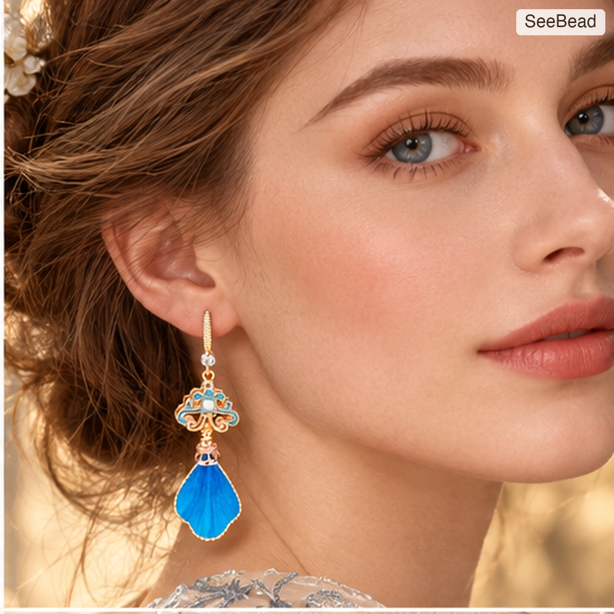 Blue Feather Handmade Ronghua Earrings - worn