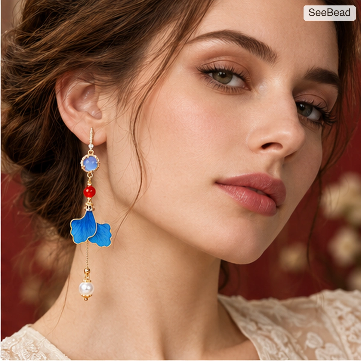 Blue Leaf Handmade Ronghua Earrings - worn