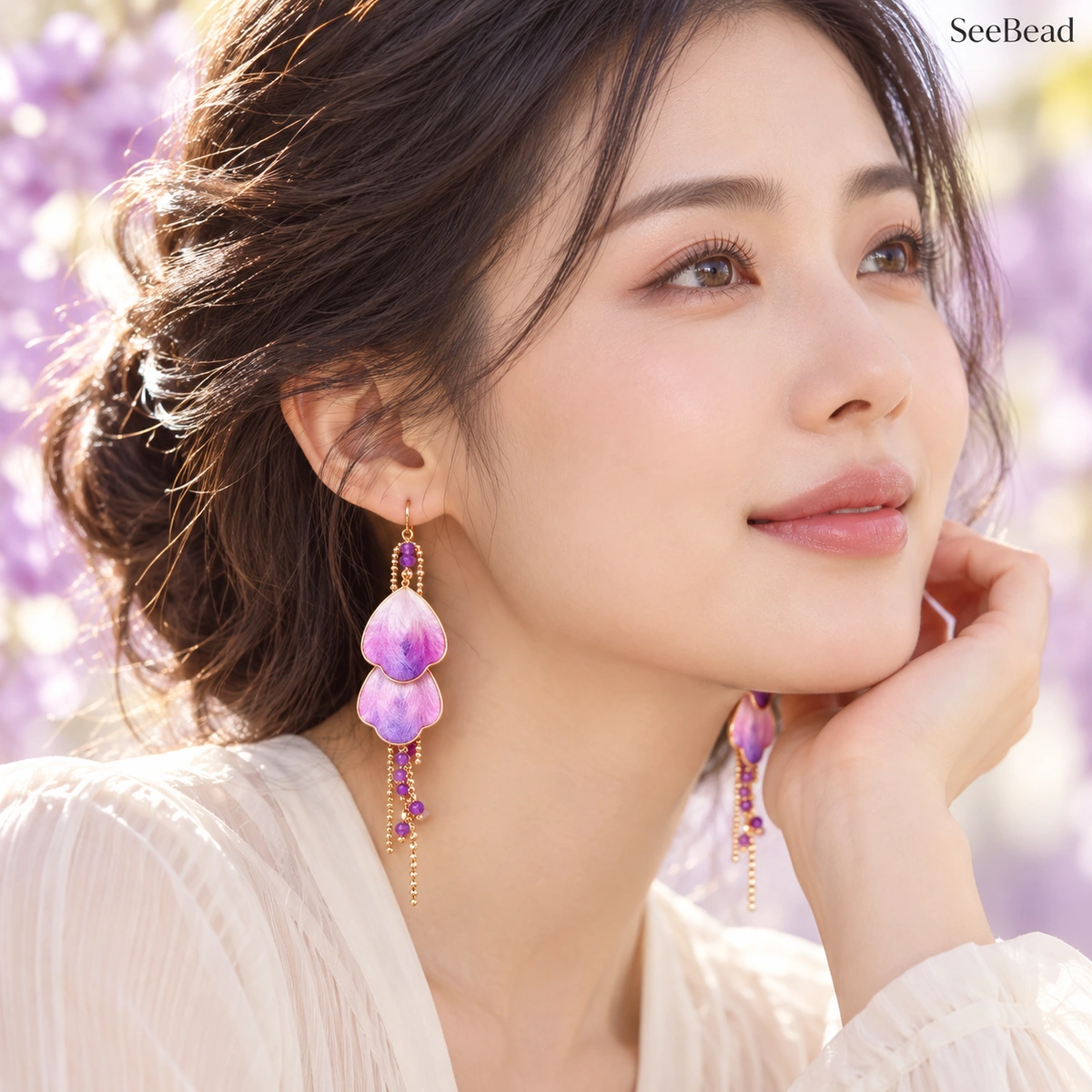 Woman wearing Wisteria silk drop earrings