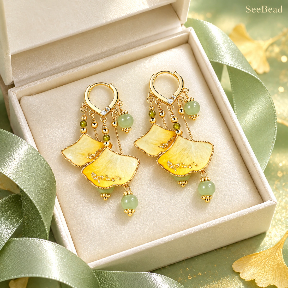 Twin Ginkgo earrings in an ivory gift box