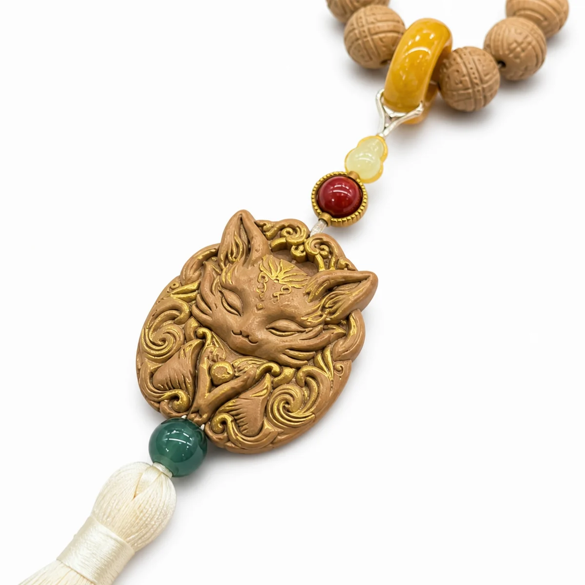 Carved Fox Tassel Beads - Design Detail