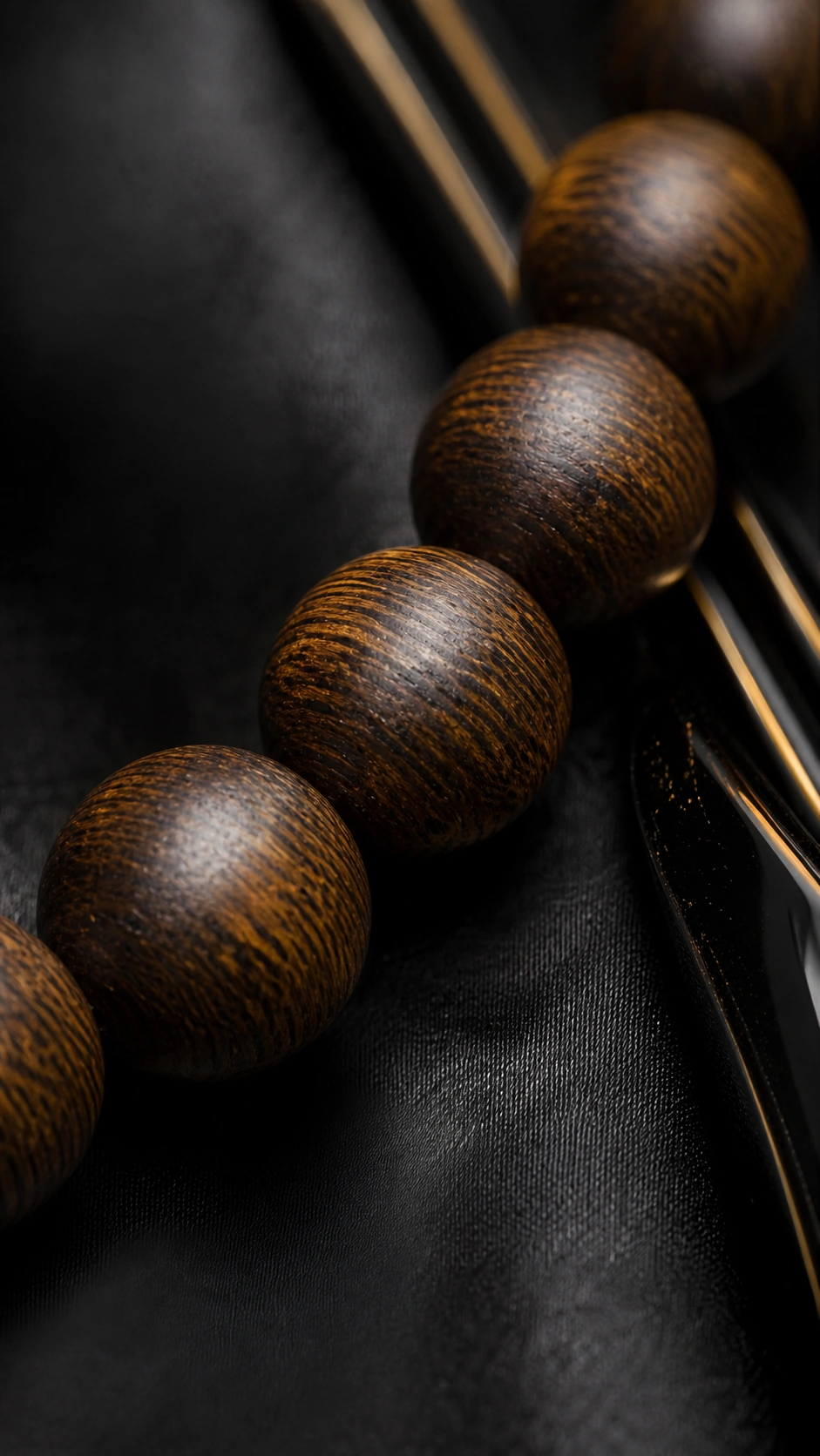Dalagan Agarwood Bracelet, 10mm product view showing materials, bead shape, texture and design details, wood grain and material detail