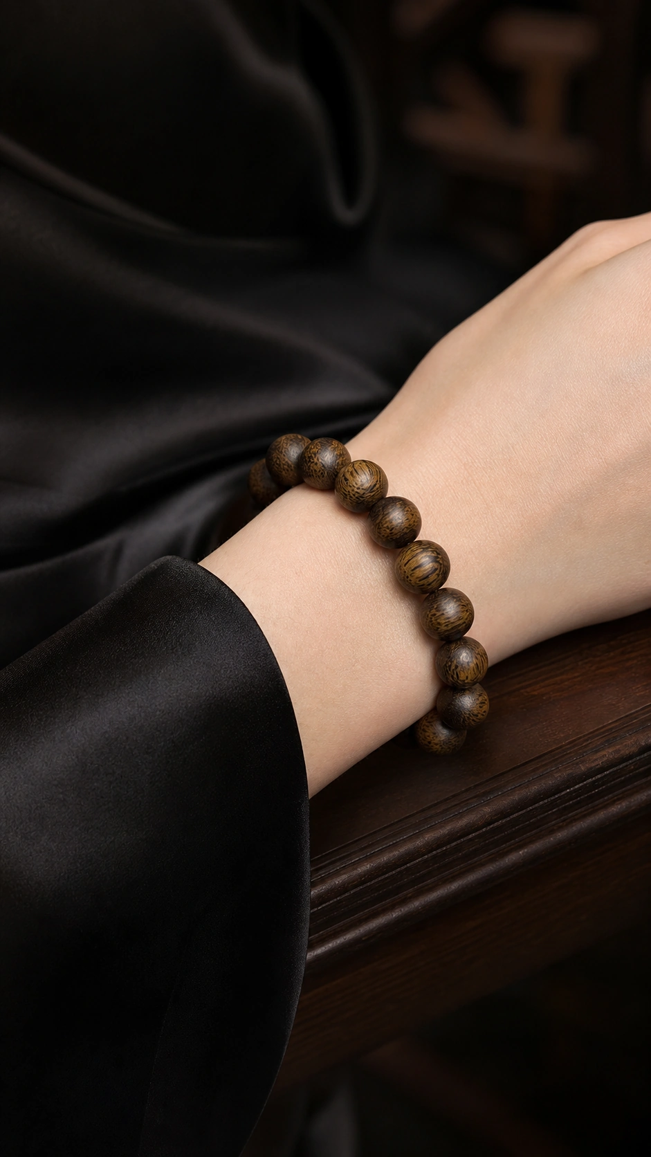 Dalagan Agarwood Bracelet, 10mm product view showing materials, bead shape, texture and design details, worn styling view