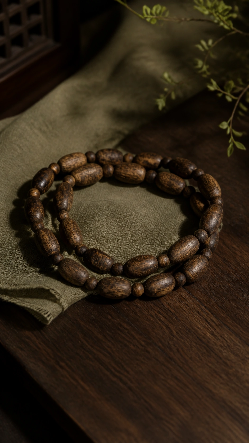 Brunei Agarwood Bracelet with Amber and Nanhong, 6mm product view showing materials, bead shape, texture and design details, styled incense scene