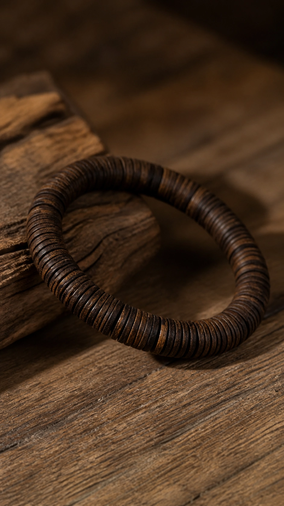Dalagan Agarwood Disc-Bead Bracelet product view showing materials, bead shape, texture and design details, wood grain and material detail