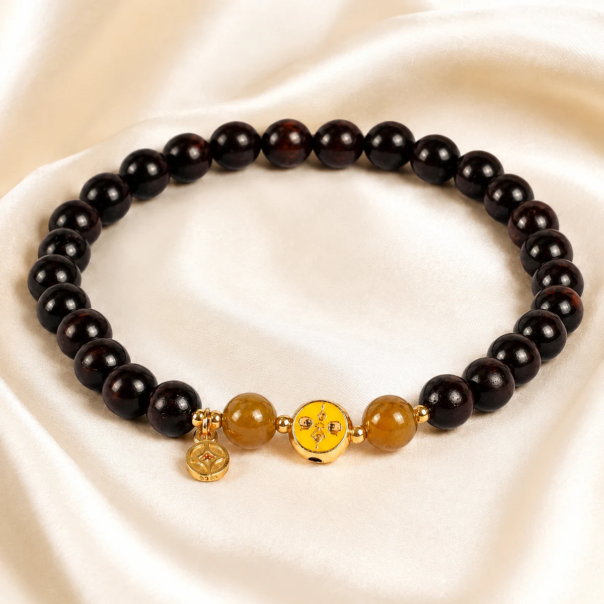Dark wood and honey bead bracelet on silk