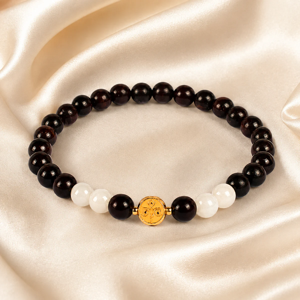 Dark wood and white bead bracelet on silk