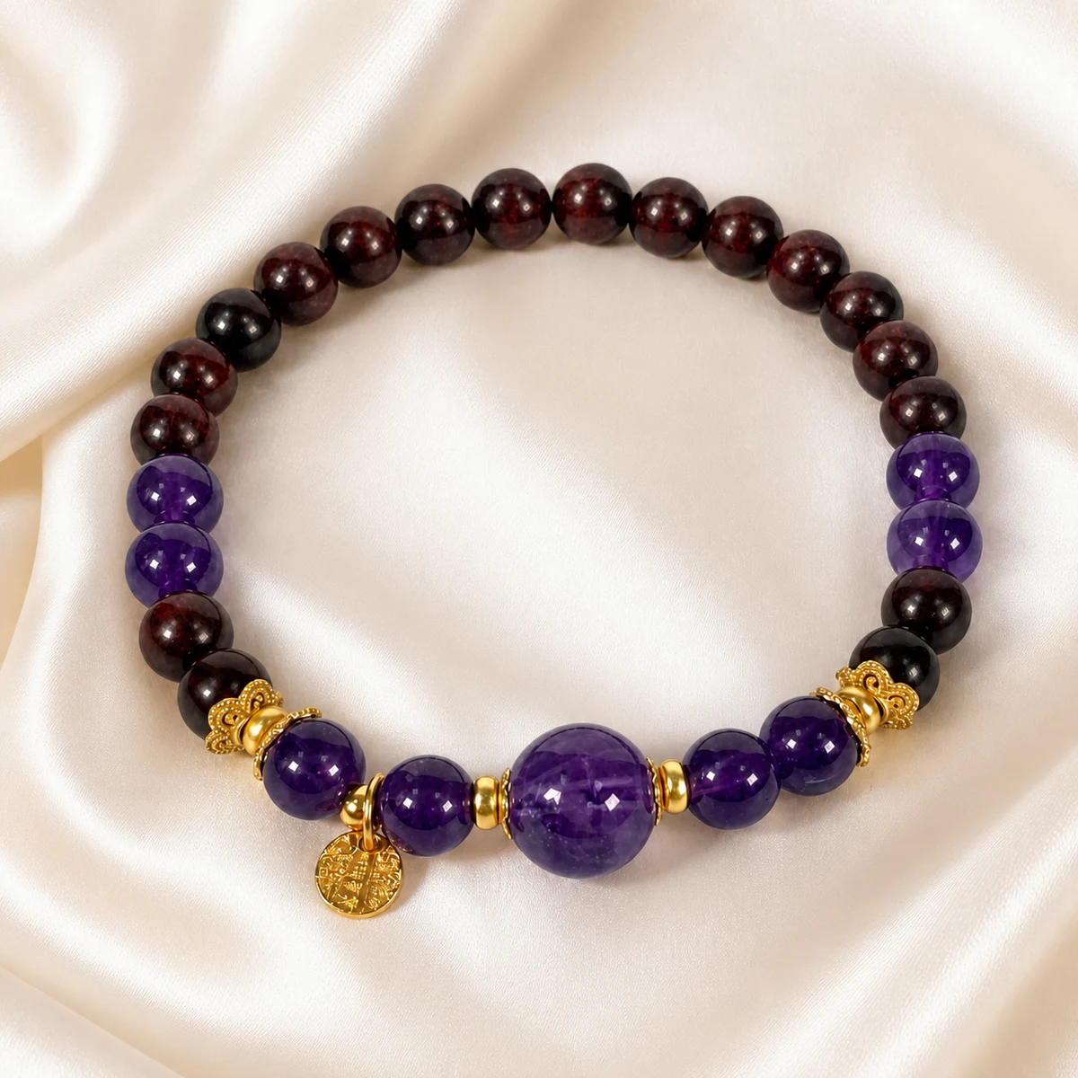 Purple gemstone and dark wood bead bracelet on silk