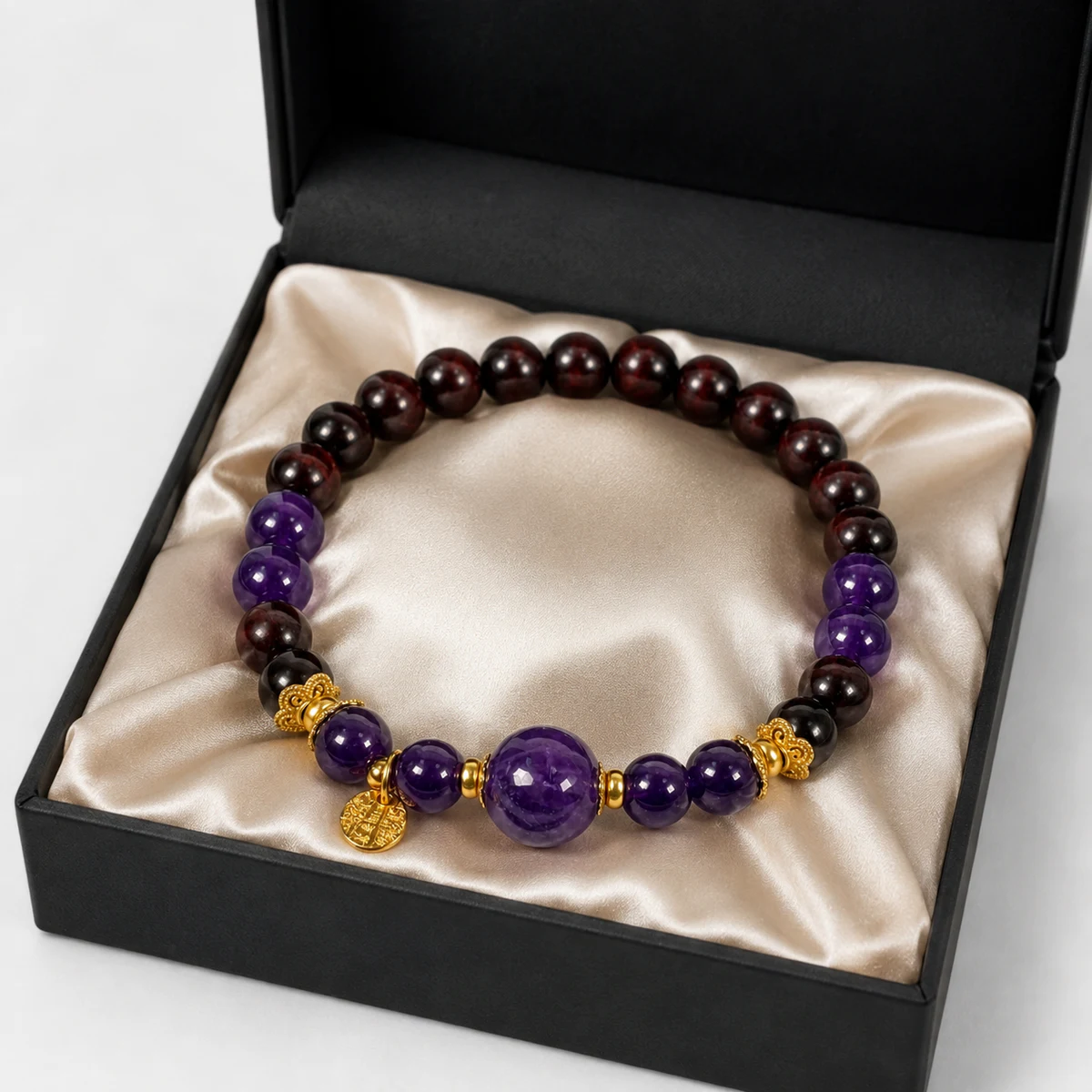 Purple gemstone and dark wood bead bracelet in gift box