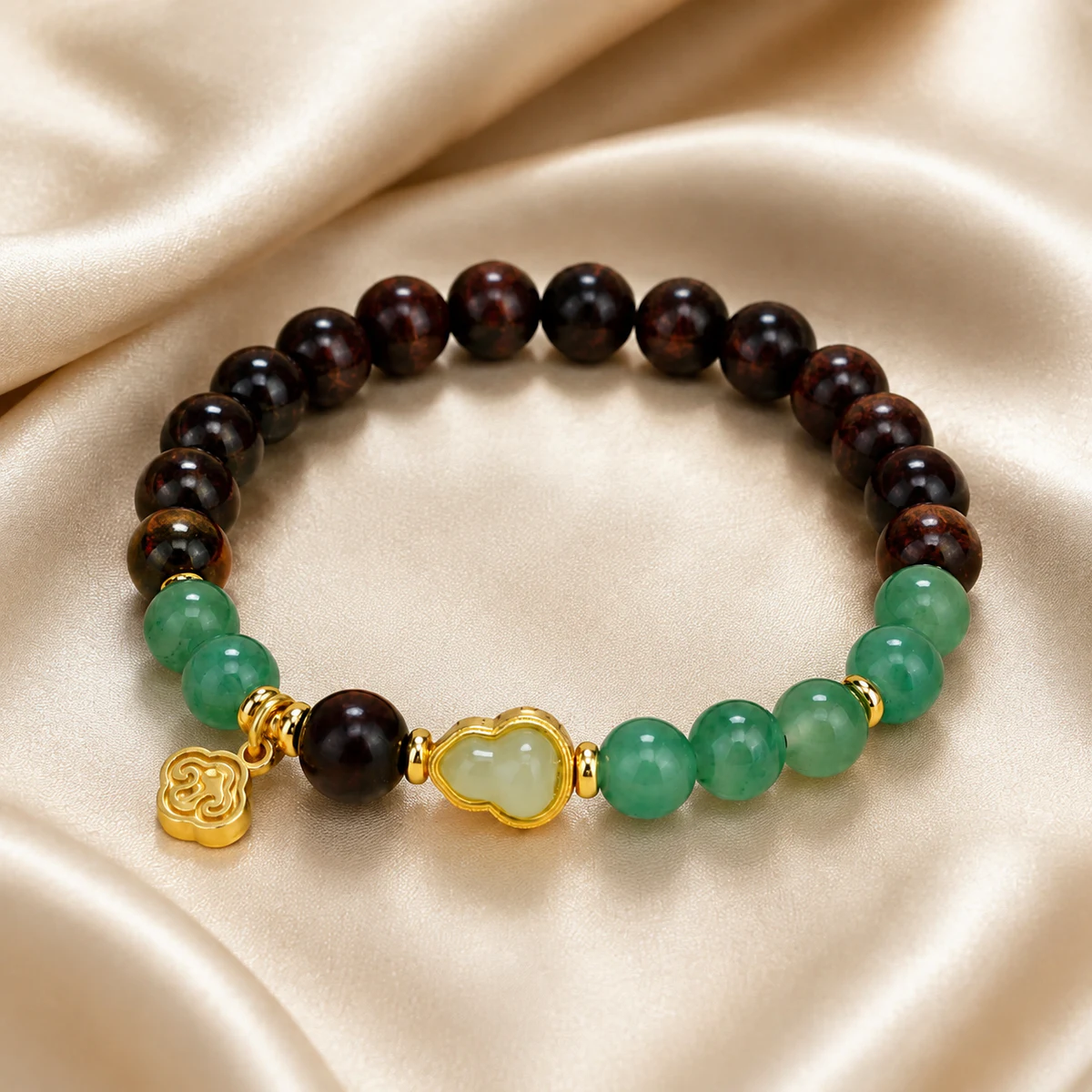 Wood and green jade bracelet on silk