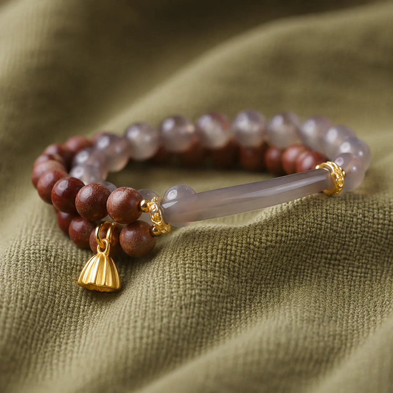 Pink gemstone bead bracelet charm and wood bead detail
