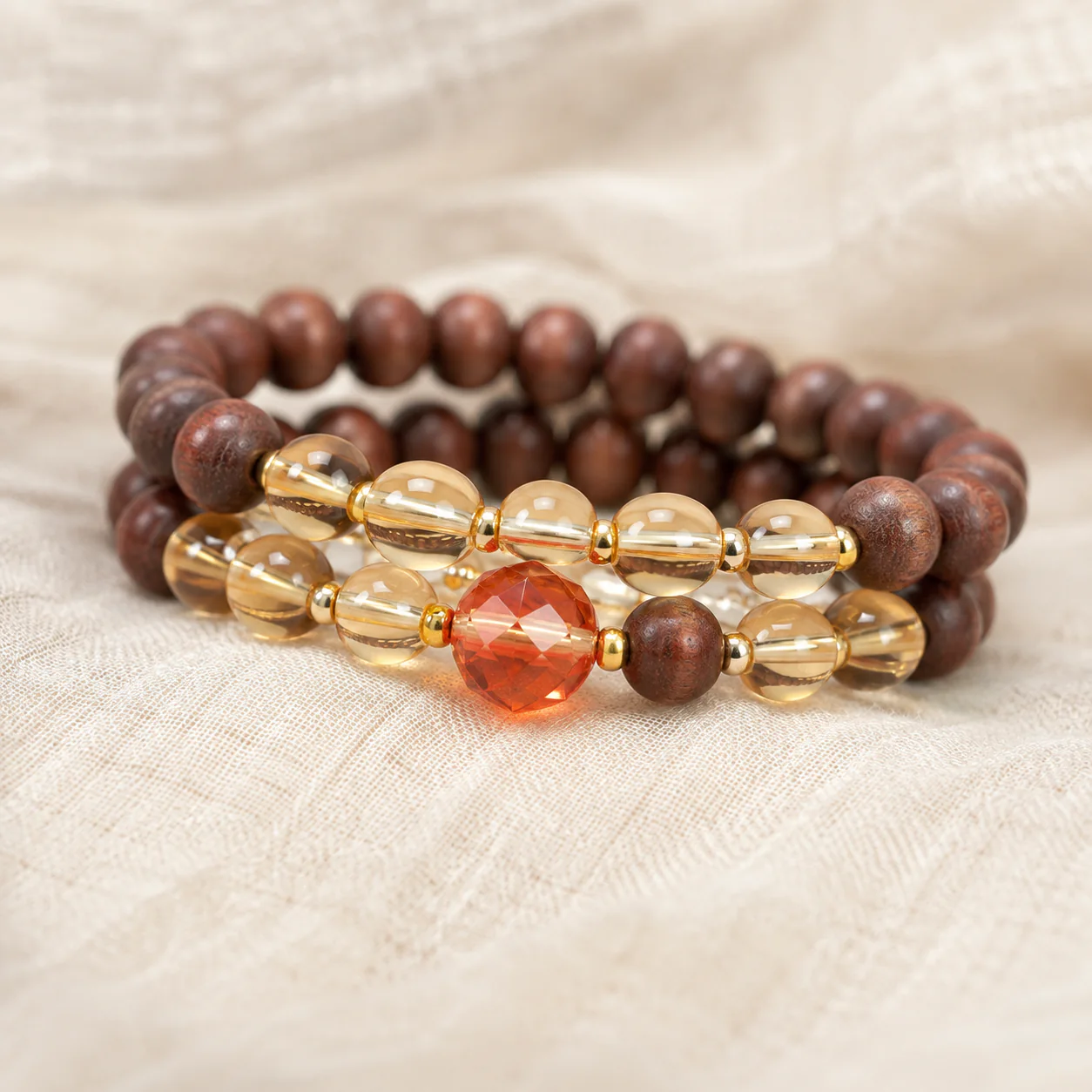 Amber-tone incense bead bracelet centerpiece detail