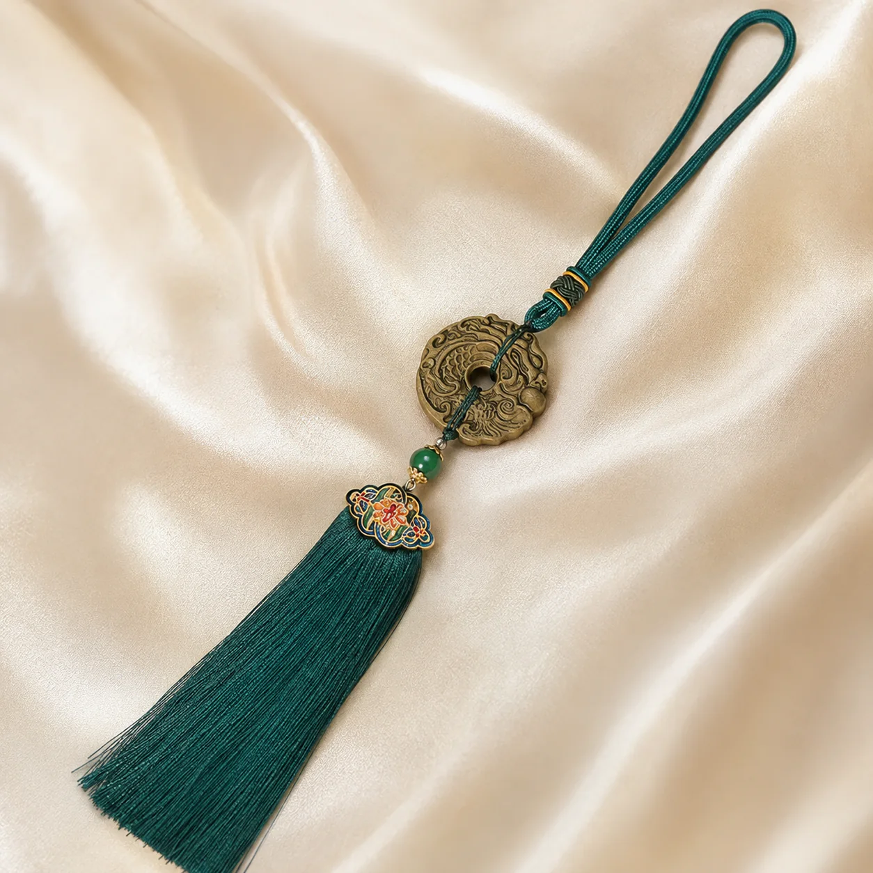 Green tassel hanging ornament medallion detail