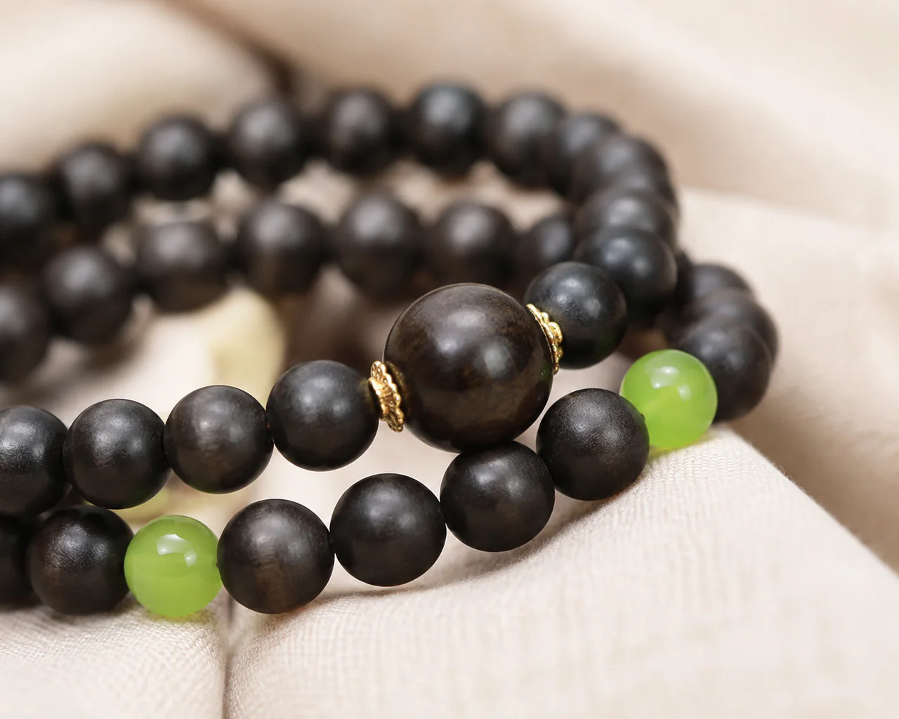 Dark incense bead multi-wrap bracelet centerpiece detail