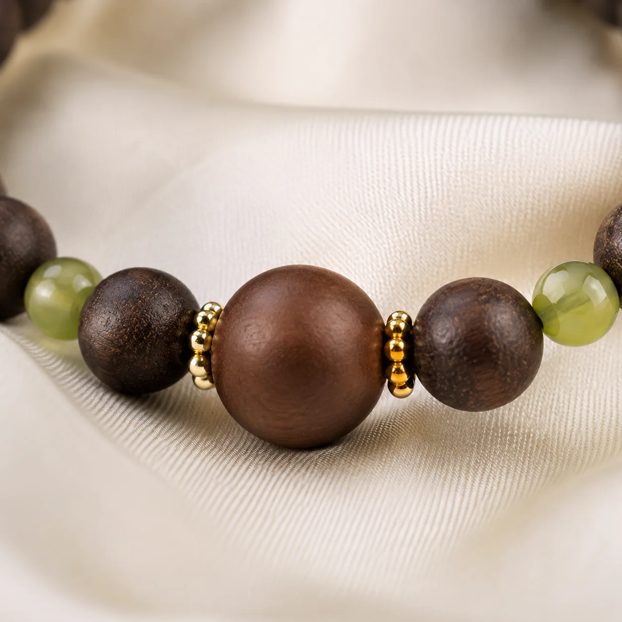 Dark wood bead bracelet centerpiece detail