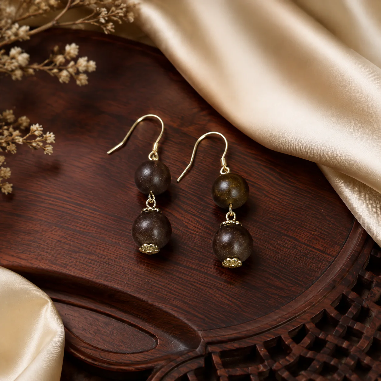 Brown wood bead drop earrings in a refined setting