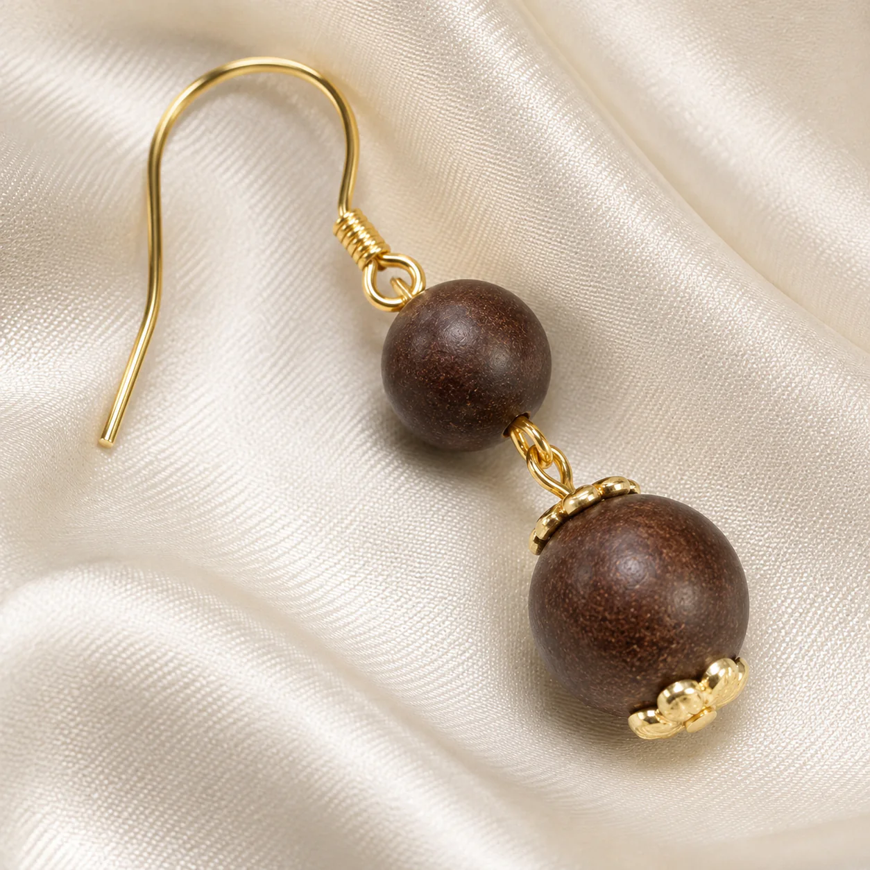 Brown wood bead drop earring detail
