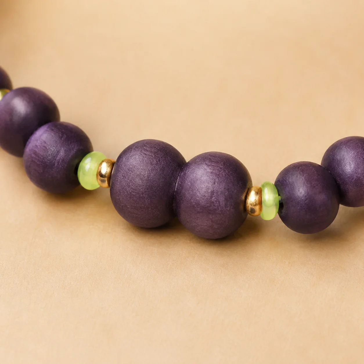 Plum wood bead bracelet material detail