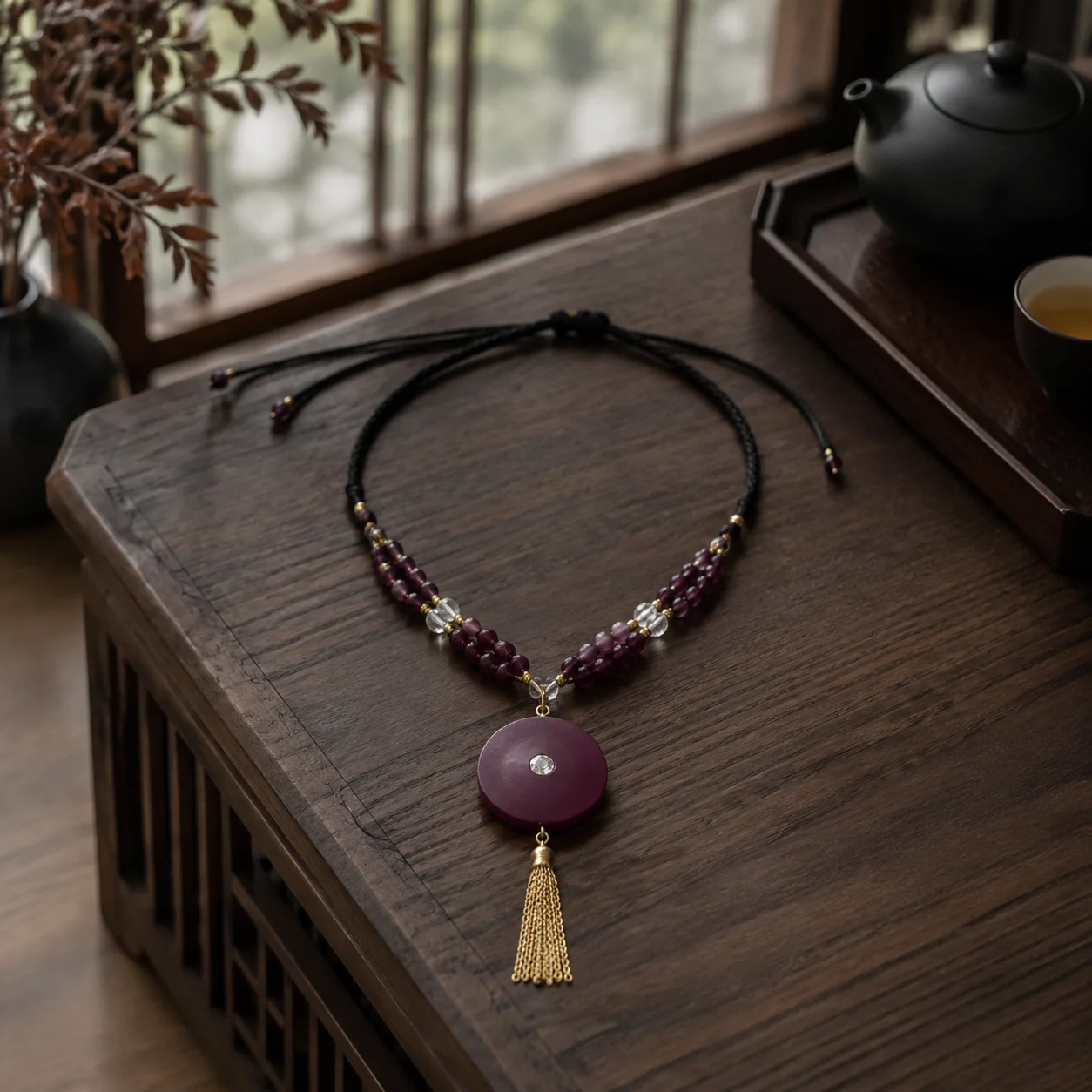 Plum wood pendant necklace in a refined setting