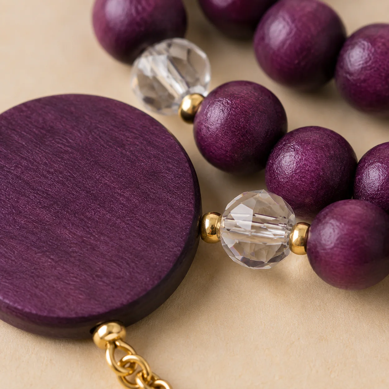 Plum wood pendant necklace material detail