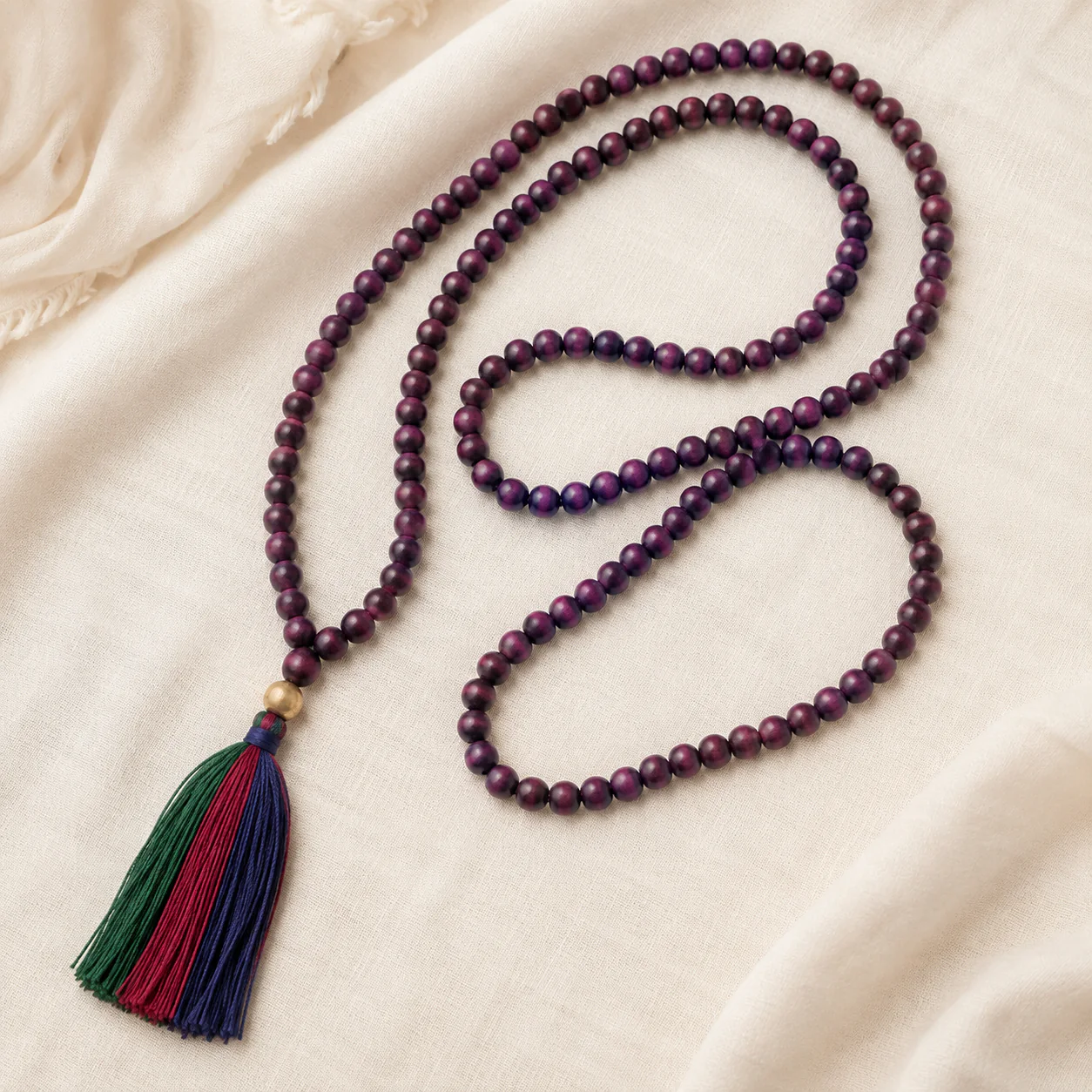 Plum wood bead mala full strand detail