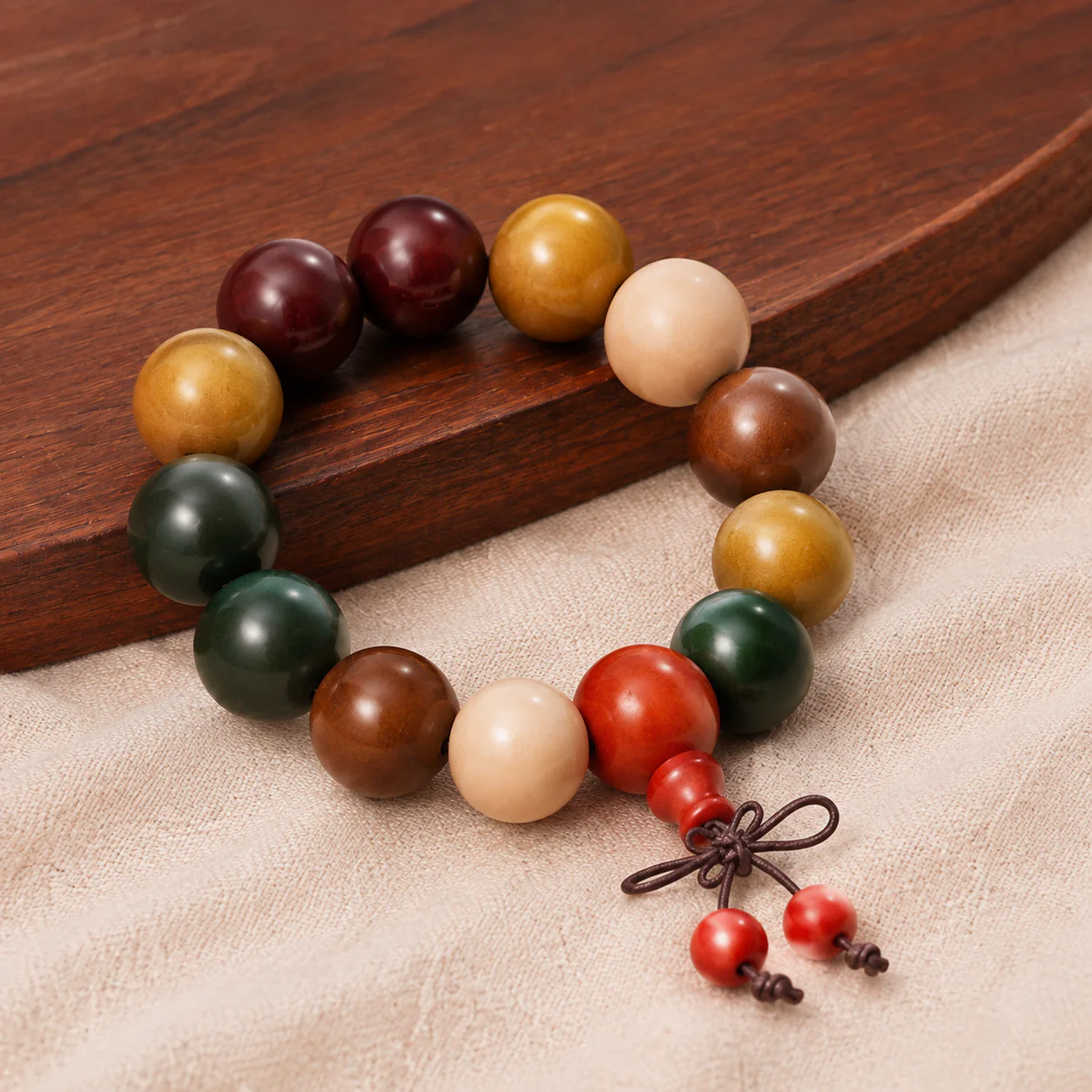 Five-color wood bead bracelet in a refined setting