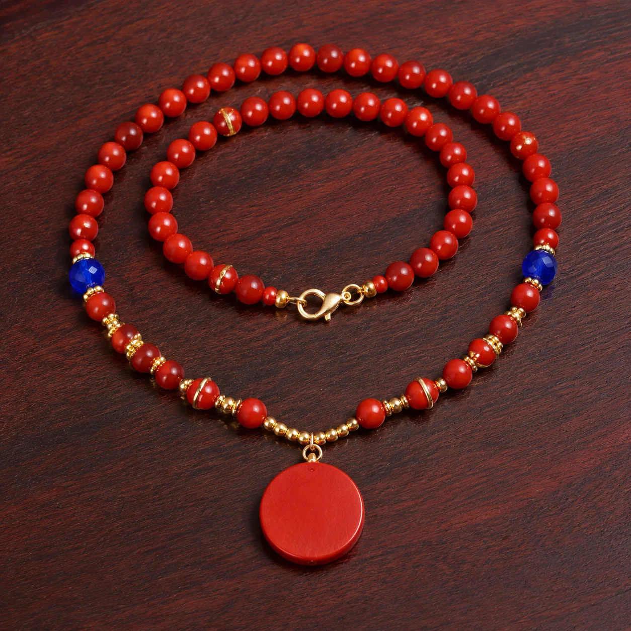 Red wood bead pendant necklace full strand detail