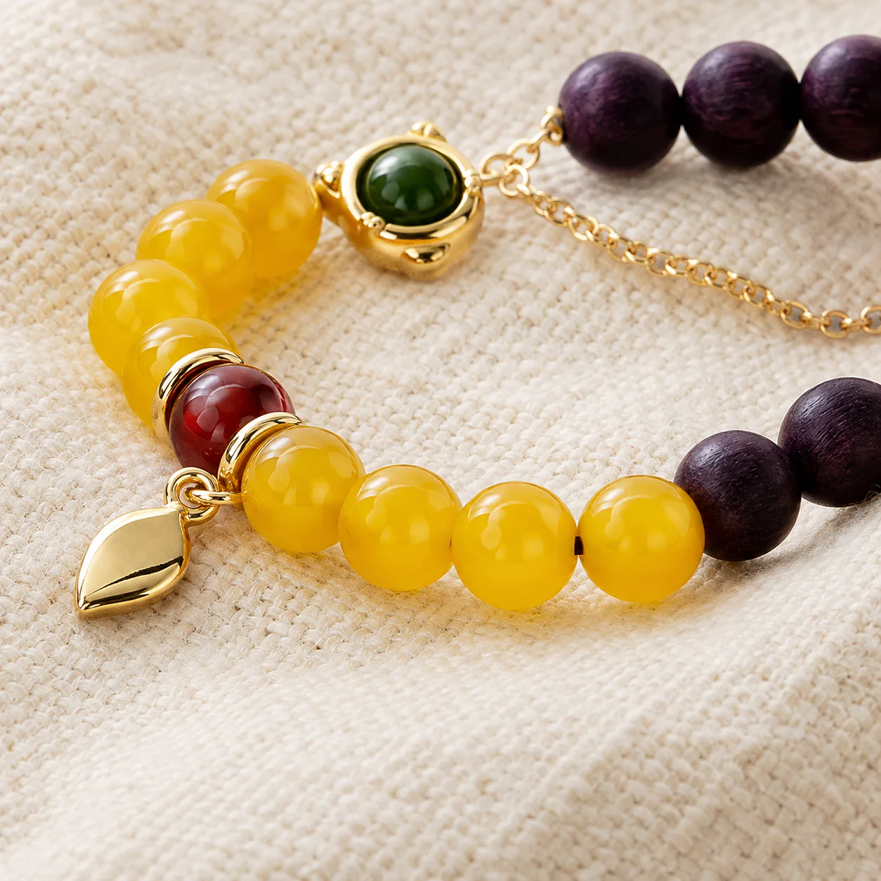 Yellow jade and purple wood bead bracelet material detail