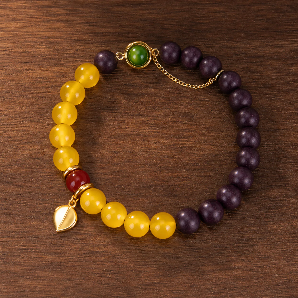 Yellow jade and purple wood bead bracelet full strand detail