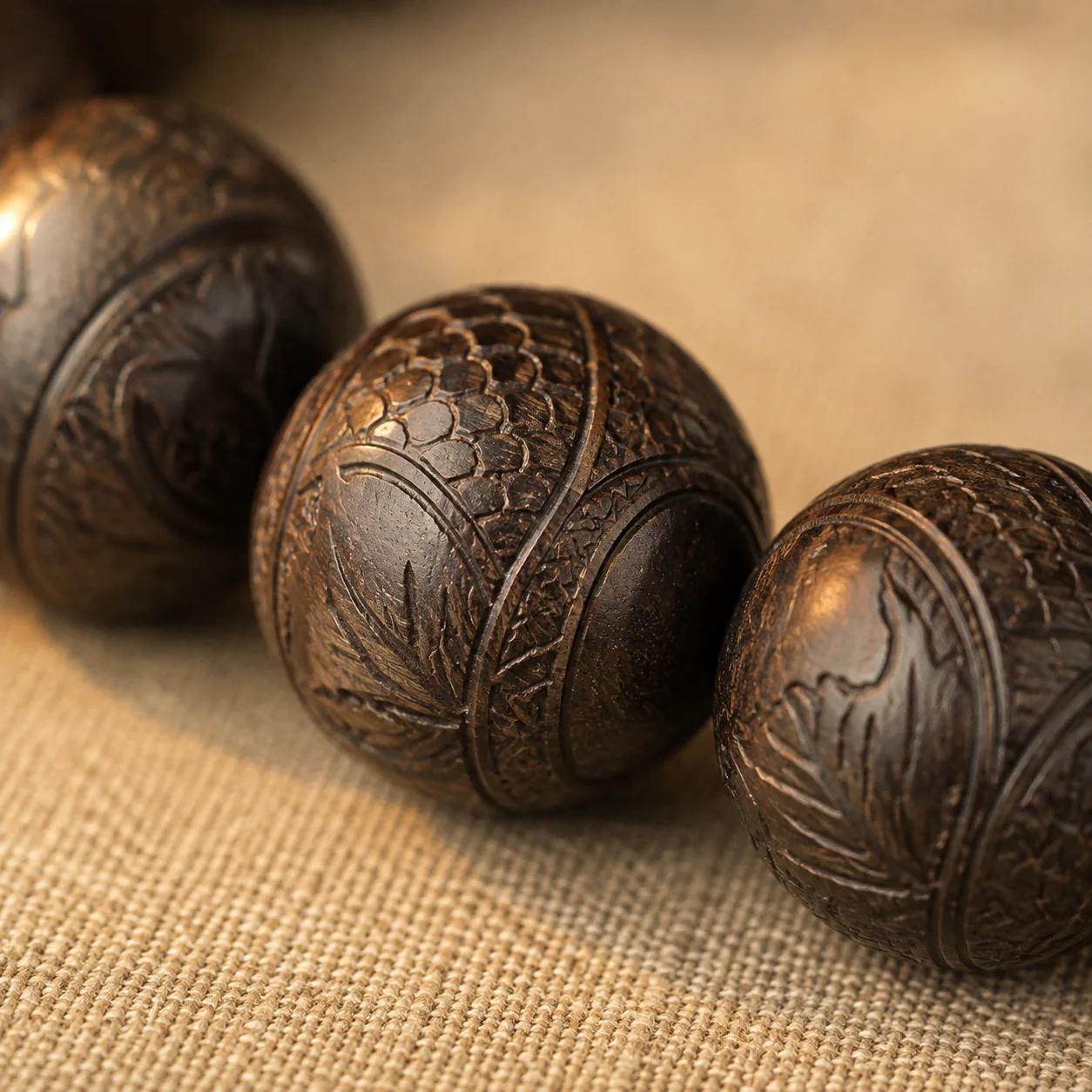 Dark carved wood bead bracelet material detail