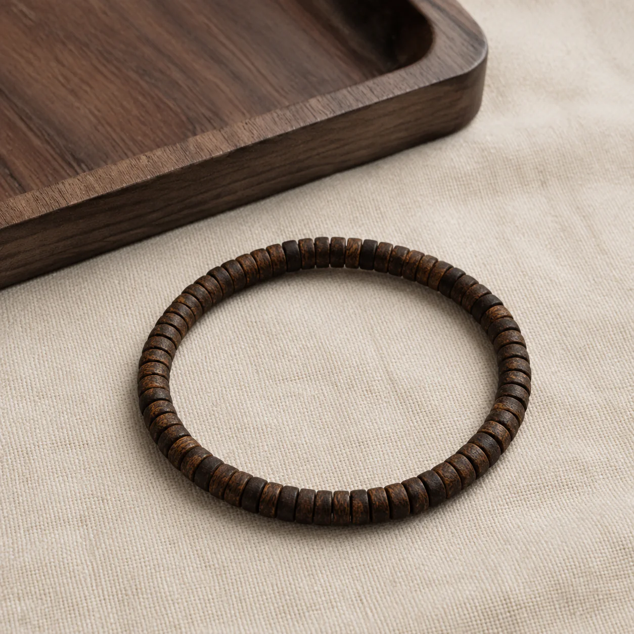 Agarwood disc-bead bracelet in a refined setting