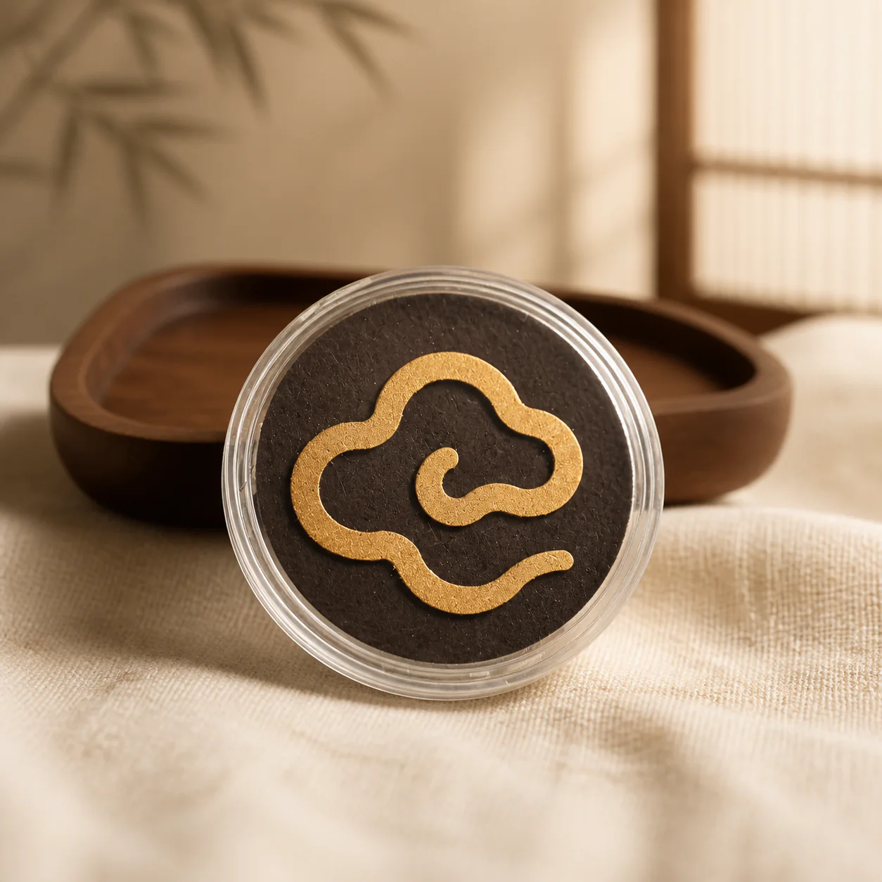 Agarwood incense medallion in a refined setting