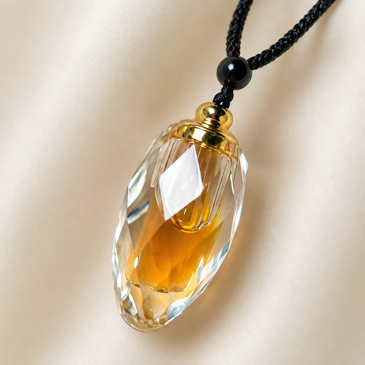Amber-tone agarwood pendant crystal detail