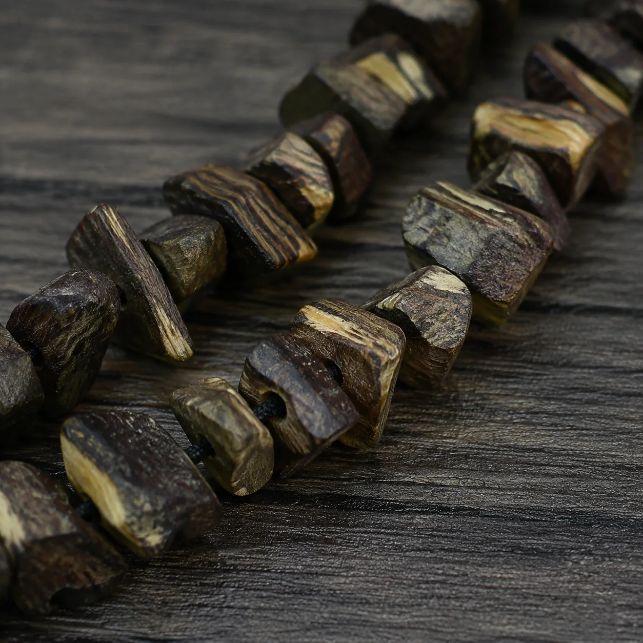 Irregular agarwood prayer beads wood-chip detail